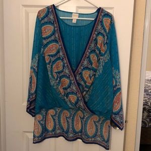 Size 2 Chicos turquoise tunic with multi colored design.